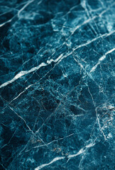 Beautiful winter natural blue ice texture. Nature abstract pattern of white cracks. Winter vertical background, mockup, flat lay, copy space, close-up, top view.