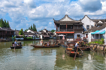 Obraz premium Sightseeing Boats in Zhujiajiao Ancient Town (called Shanghai Venice). Zhujiajiao is an ancient water town well-known more than 1700 years