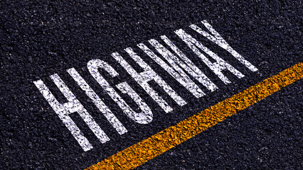 Obraz premium HIGHWAY, highway text written and yellow line on asphalt road ground.