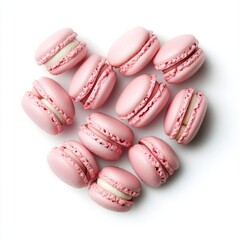 Obraz premium Pink macarons in a heart-shaped arrangement isolated on white background