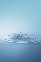 Round water drops over circles on lake. Water drop, swirl and splash, splashes. Phone wallpaper. Wavy circles on water and blue reflections on water surface