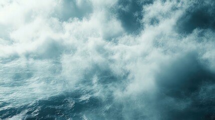 Obraz premium Serene ocean waves enveloped in ethereal fog creating a tranquil and dreamy seascape atmosphere.