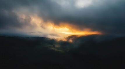 Dramatic sunset with blurred long exposure showcasing atmospheric clouds and vibrant colors in a moody landscape setting