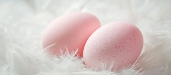Pink boiled eggs nestled on soft white feathers creating a serene and delicate spring setting for festive celebrations.
