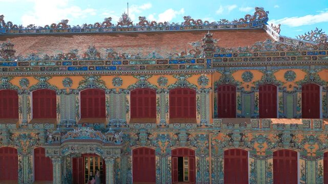 The vibrant Kien Trung Palace showcases exquisite architectural details and intricate decorations, embodying the artistic heritage of Hue Imperial City, Vietnam.