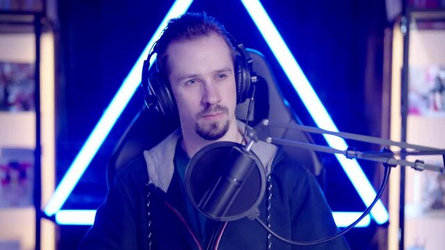 Male gaming streamer focused celebrating winning the game 4K
