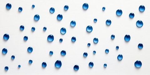 Blue Water Droplets Scattered On White Surface
