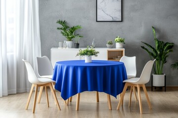 Modern Dining Room with Blue Tablecloth and White Chairs