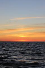Sunset by the ocean