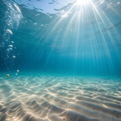 The water is clear and the sun is shining on it. There are bubbles in the water