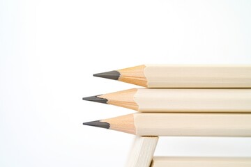 A pile of colorful pencils stacked on top of each other