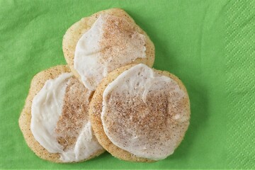 Group of home made Irish cream cookies on a green napkin. 