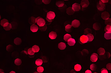 Soft image abstract bokeh dark red with light background.Red,maroon,black color night light elegance,smooth backdrop,artwork design for new year,Christmas sparkling glittering or special day..