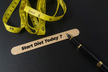Medical concept with a text Start Diet Today on black background