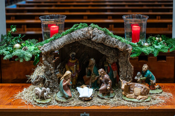 Beautiful Nativity Scene with Figurines Depicting the Birth of Jesus Christ and Village Life at the Guards Chapel church in London, England