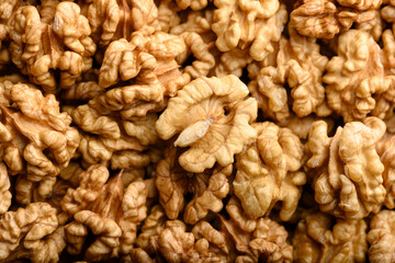 Heap of walnut kernels close up. Food photography