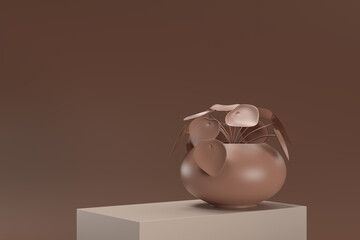 A vase with a plant in it sits on a brown surface