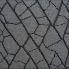 Obraz premium Dark gray stone wall forming abstract geometric pattern