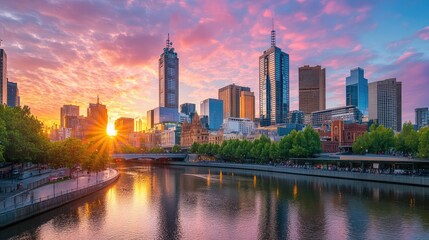 Naklejka premium Scenic cityscape with a river reflecting the skyline during golden hour