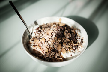 cup of oatmeal with spoon
