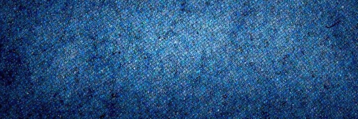 Fototapeta premium Distressed denim fabric texture with subtle wear effects, rough weave, wrinkled fabric