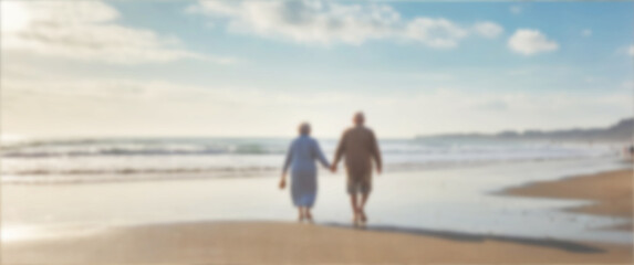 Soft-focused image of an older person strolling by the waves, symbolizing calm and simplicity, blurred background, retire, relax, beach