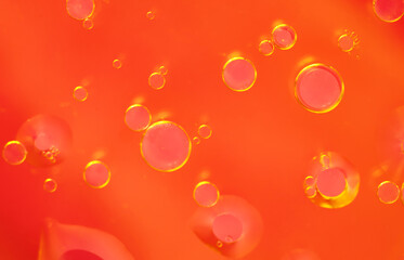 Close-Up of Vibrant Red and Orange Oil Bubbles Background. abstract macro cool