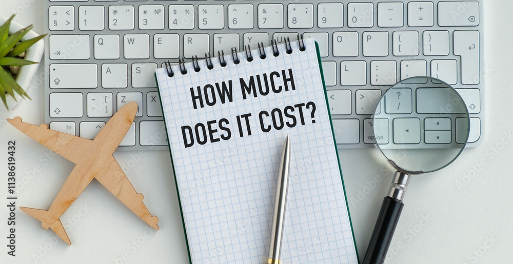 Poster a notebook with a pen on it and the words how much does it cost written on it