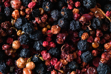 Dried Mixed Berries - blueberries, lingonberries Close-Up with Rich Textures and Colors. Top view.