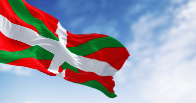 Detail of the Basque Country flag waving in the wind