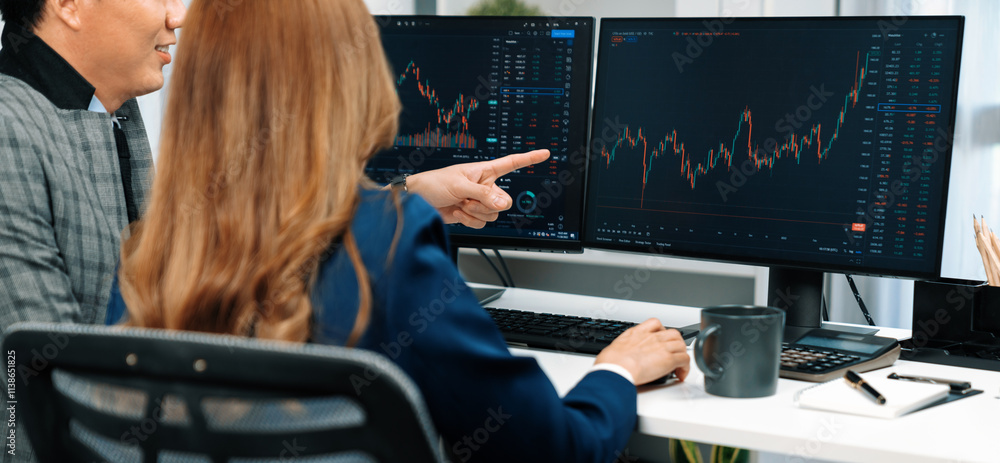 Poster panoramic photo asian business partners pointing to dynamic stock exchange data on computer screen v