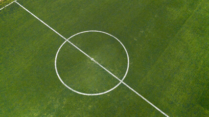 Aerial view of the midfield circle of a five-a-side football pitch. © Stefano Tammaro