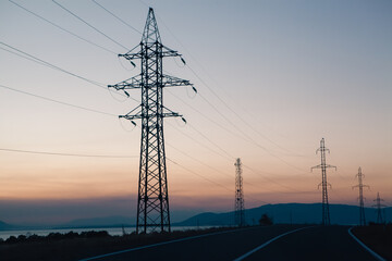 silhouette of high voltage tower