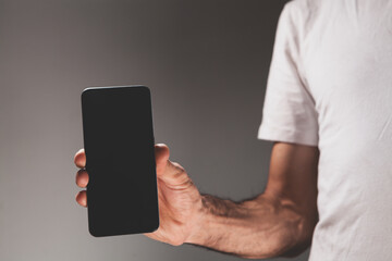 close up of a man using mobile phone,
