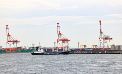 Container port at Osaka Japan, container crane at Industrial port for cargo container ship. Cargo...