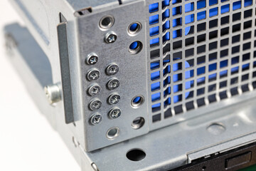 Close up detail of internal HDD cage or HDD rack for computer data storage server or workstation, Shows spare screws.