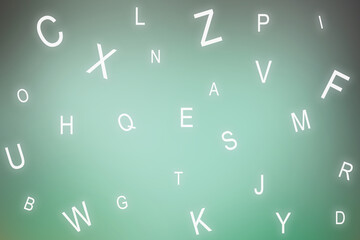 Educational background with scattered letters on a green gradient. Abstract composition with random letters and soft colors. Blackboard background.