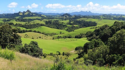 Scenic green rolling hills landscape under blue sky.