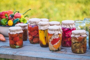 canning vegetables in jars. Selective focus