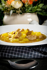 Borscht with potato and white sausage.