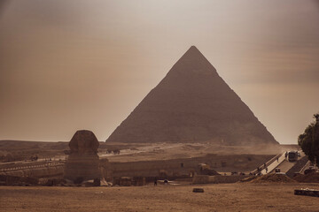 Sphinx in front of one of the great pyramids.