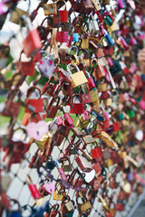 A love lock or love padlock is a padlock that couples lock to a bridge