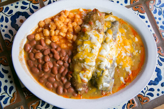 Taos, New Mexico, USA. Typical southwest regional food. Tamale, chile relleno, enchilada, beans and posole.