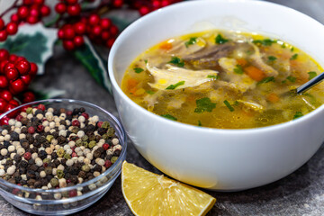Homemade Chicken Soup with Fresh Ingredients in Festive Setting