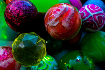 abstract bright colored kaleidoscope inspired textured bouncy balls fun color swirl party background