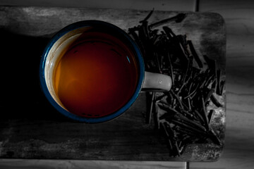hot tea drink in enamel cup