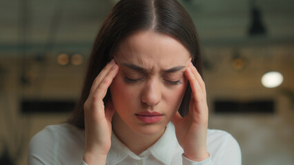 Caucasian businesswoman business woman female lady office worker student studying online work laptop feel headache suffer migraine health problem stressed girl unwell head tension hurt pain overwork