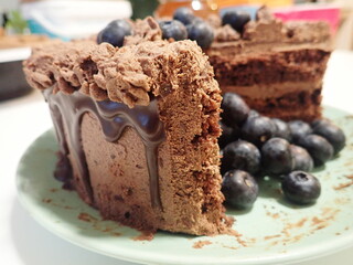 sweet decorated chocolate cake with blueberries