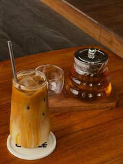 Iced coffee and tea on a wooden table