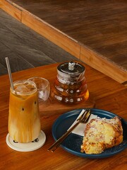 Iced coffee and tea on a wooden table